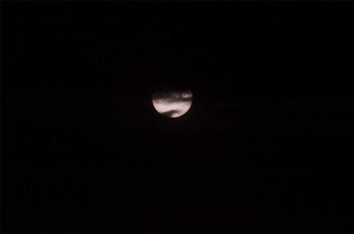 Venus Transit June 5, 2012 - Venus plays Peek a Boo through the clouds