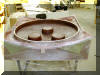 Tailpiece in mold. Each bump is a recess for 4 cooling fans, three total. 16 OCT 2001 Chuck Hards image