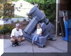 Bruce Grim & granddaughter with the base of the 81 cm (32") telescope. 26 JUN 2001