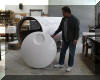 Chuck Hards holds the nearly completed aperture cover. The circular depression will eventually be removable to allow off-axis viewing. 24 OCT 2001