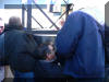 The primary mirror is lifted into place.  02 FEB 2005