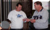 Nova Optics owner Steve Dodds receives payment for the primary and secondary mirrors from SPOC committee chairman Siegfried Jachmann.  11 DEC 2004