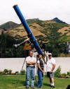 Robby, Becky & Siegfried in the backyard with the 9" 1915 refractor